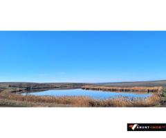 Anunturi Imobiliare Vanzare teren Loc. Frasinet, 2.000 mp, deschidere lac 50 m, comision 0